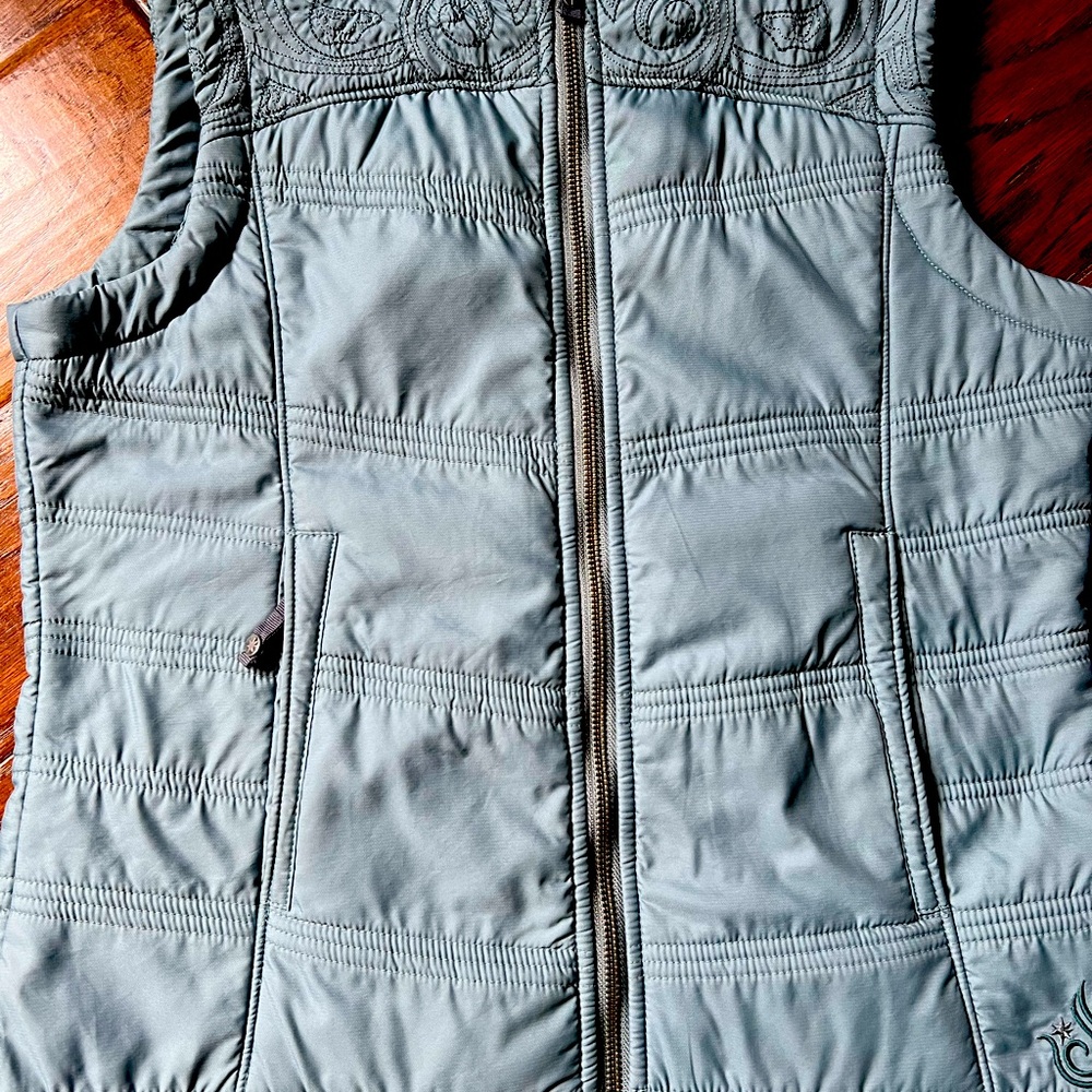 Winter vest in perfect condition size 6. Isis brand with beautiful detailing.